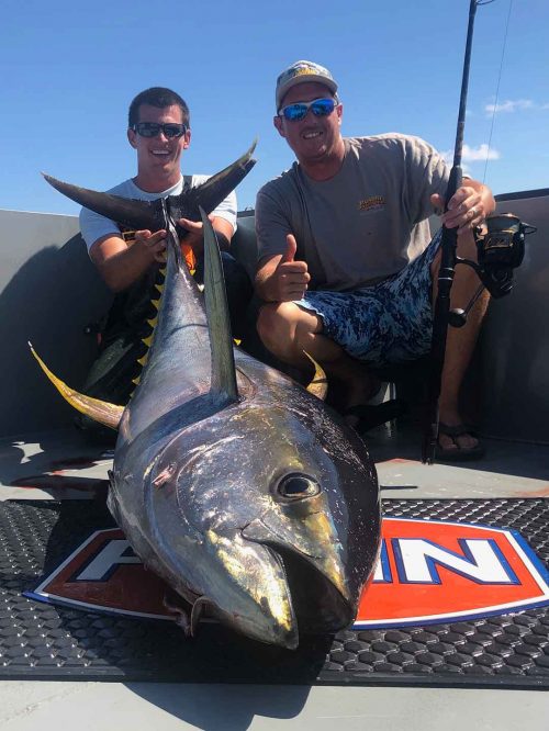 Venice, LA fishing guides hunter caballero and drew bateman catch a giant yellowfin tuna